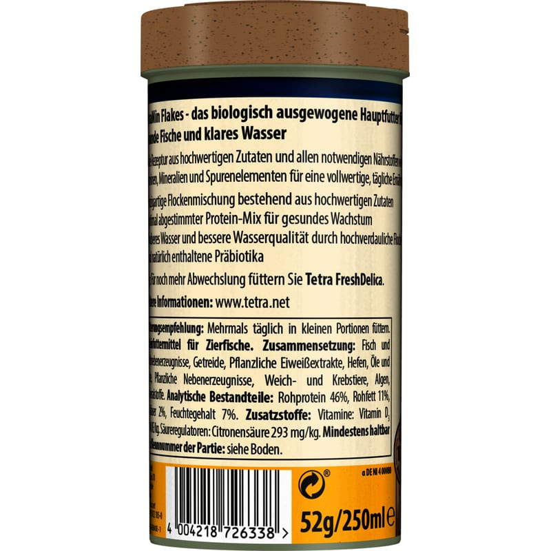 Emballage de TetraMin Flocons aliment complet pour poissons, montrant une scène d'aquarium vibrante 