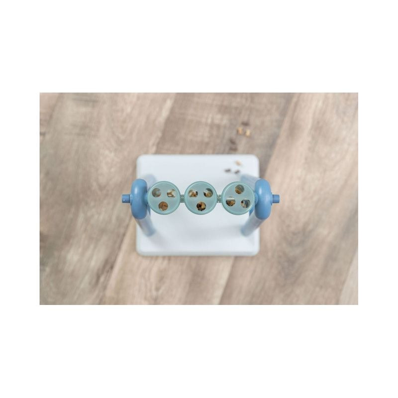 Gros plan sur le jeu de réflexion Trixie Turn Around montrant deux ouvertures de couvercle différent