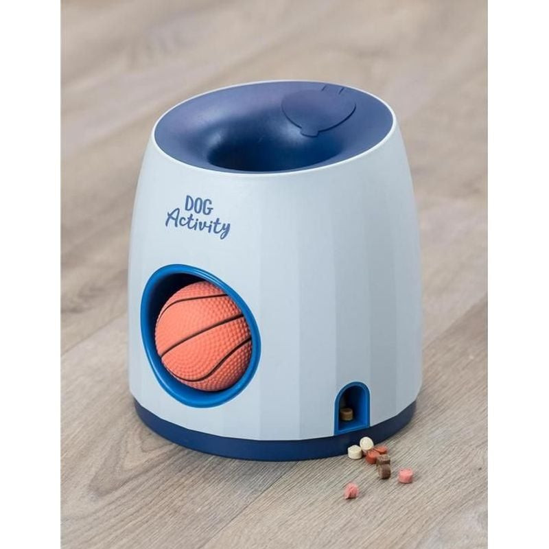 Distributeur de friandises interactif Trixie 2-en-1 pour chien posé sur un tapis, jouet blanc bleu g