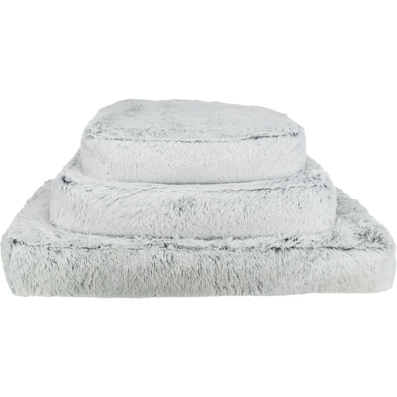 Vue latérale du coussin angulaire TRIXIE Harvey blanc/noir, montrant hauteur et texture peluche. Hou