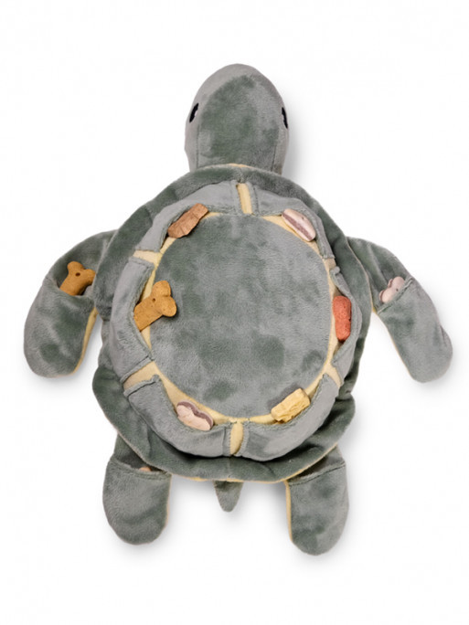 Stuffed turtle toy for dogs by VADIGRAN featuring a squeaker and treat pockets for mental stimulatio