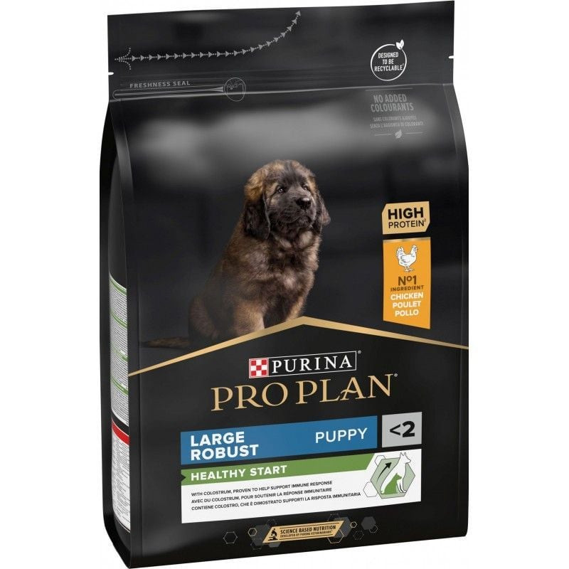 Image lifestyle d'un sac Purina Pro Plan 1967370 avec deux chiots de grande race jouant à proximité.