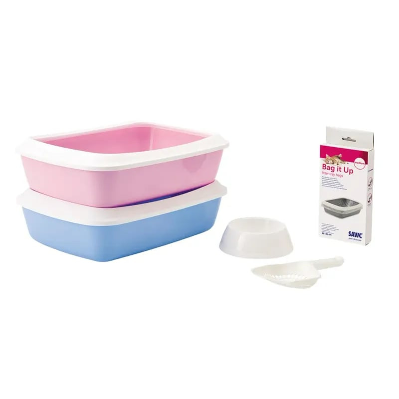 Gros plan du bac à litière Savic Iriz rose bébé avec rebord blanc, montrant sa taille et sa forme.
