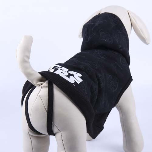 Dog wearing 1116381 Star Wars Darth Vader sweater in a cozy indoor setting.