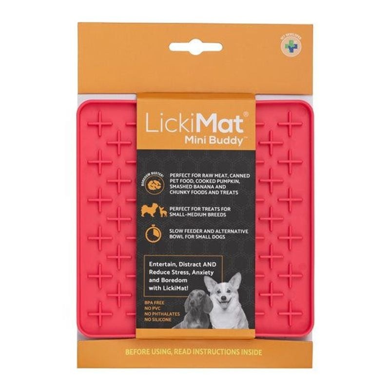 Tapis à lécher LickiMat Mini Buddy 1964533 turquoise avec yaourt sur le sol