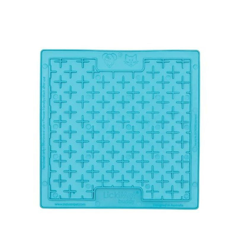 Gros plan de la surface texturée du LickiMat Classic Buddy montrant le motif en croix et les rainure