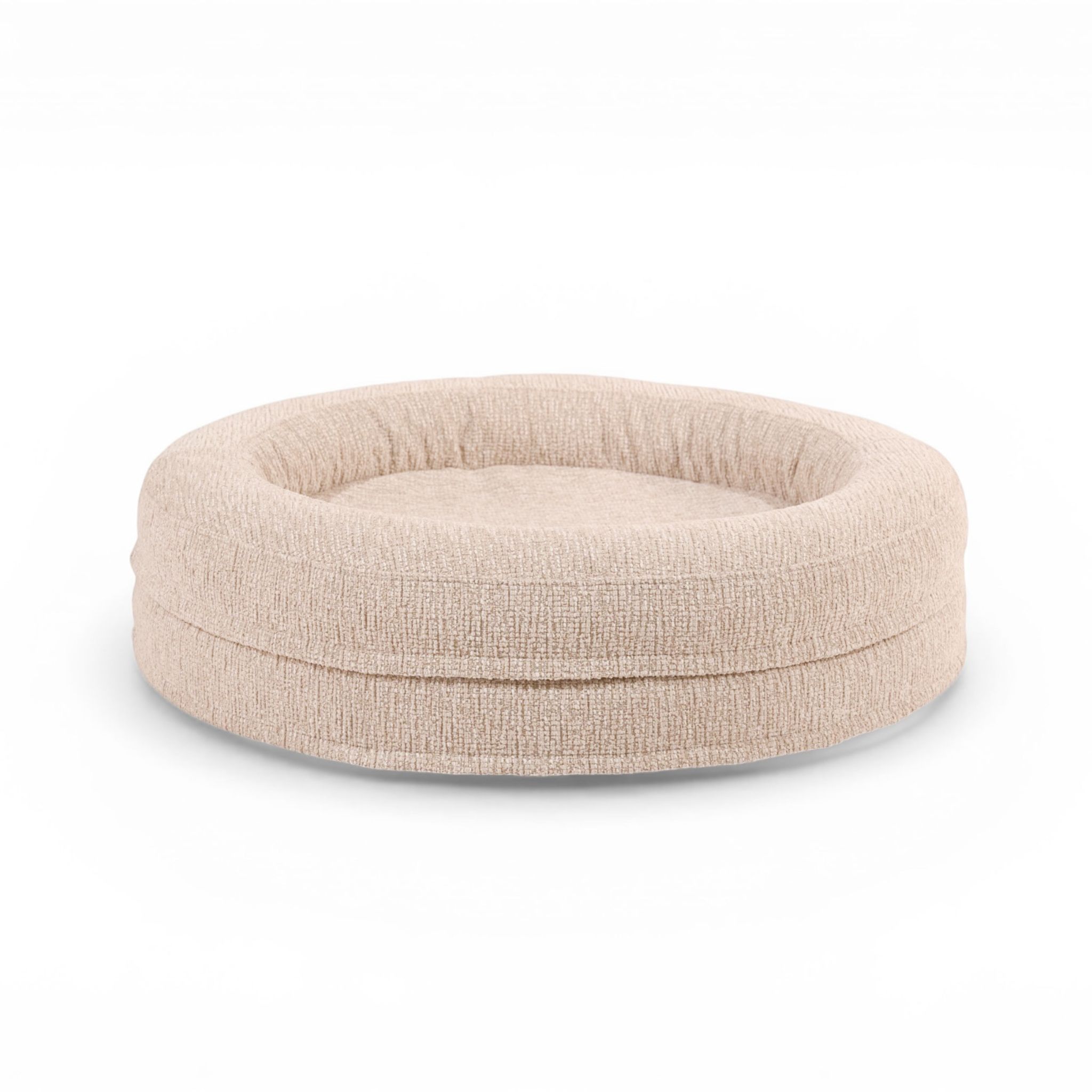 Fantail Elite Clay orthopedic dog bed in beige, round shape with plush surface, isolated on white ba