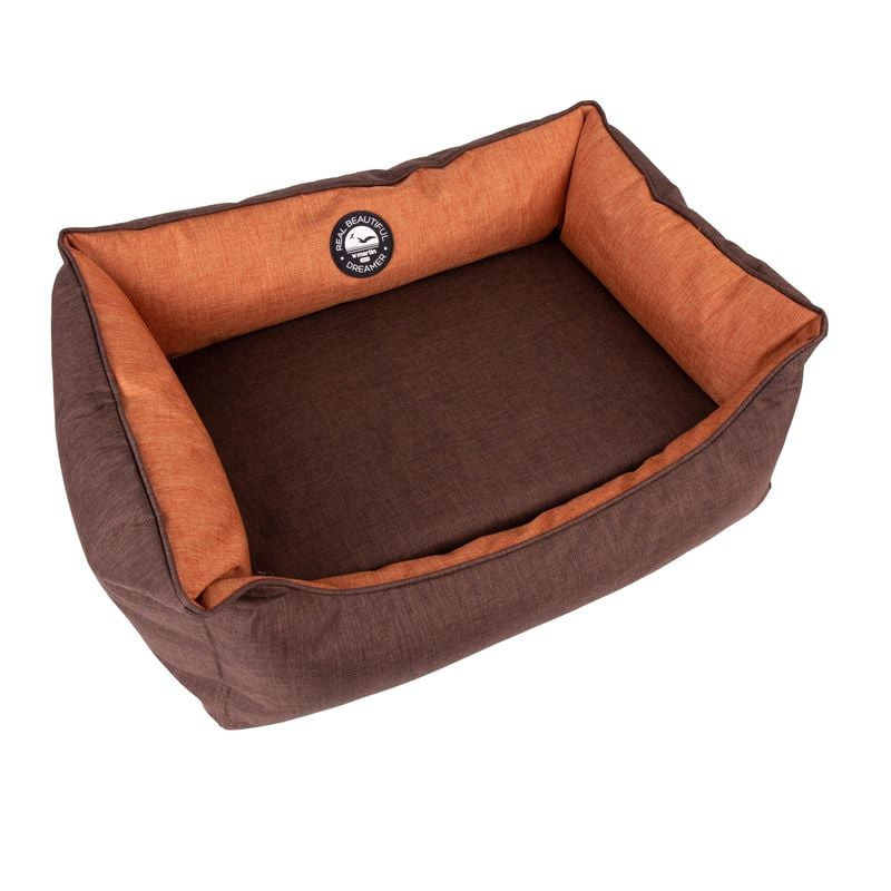 Vue en angle du panier chien Martin Sellier 1116441 marron avec intérieur orange, mettant en valeur 