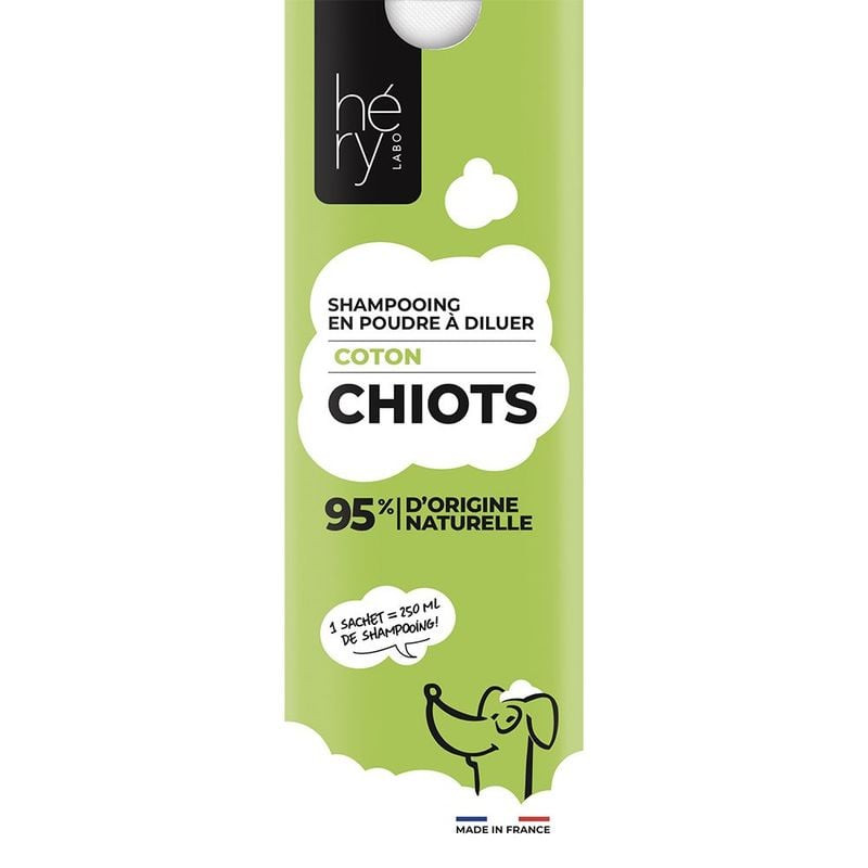 Vue avant du sachet de shampooing poudre Héry 1116013 pour chiot au coton, emballage vert, 95% ingré
