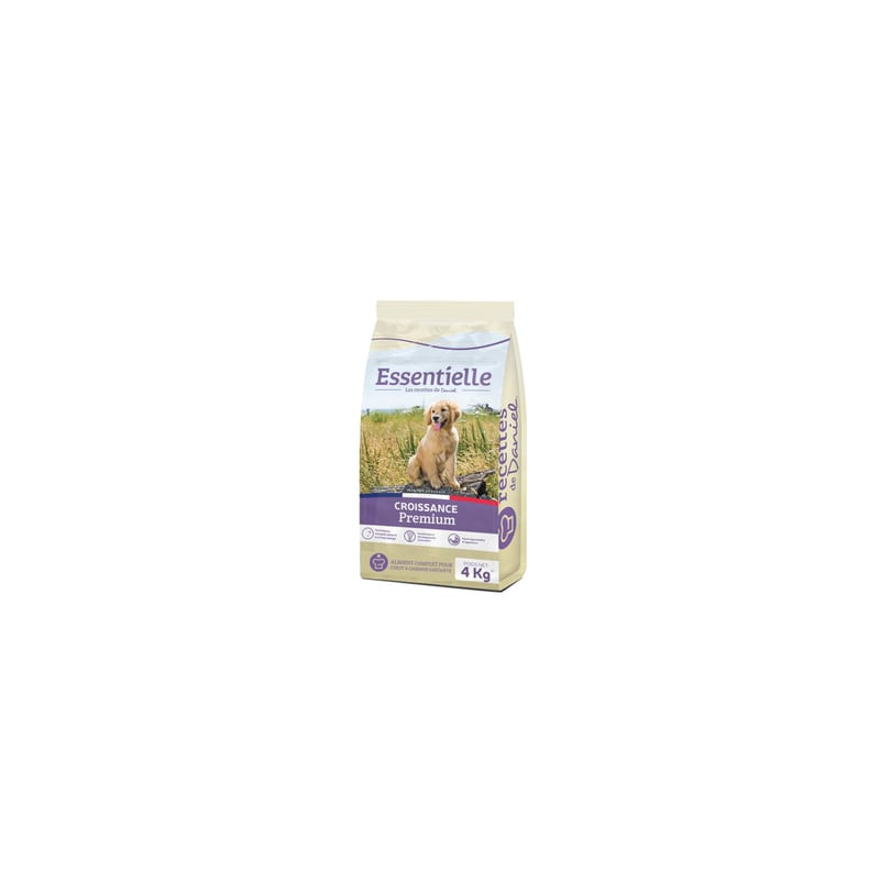 Gros plan du packshot du sac de croquettes Essentielle Croissance 4kg montrant un chiot dans un cham