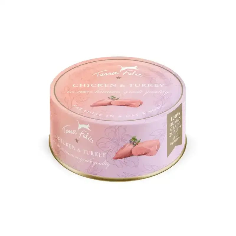Boîte de pâtée Terra Felis Poulet & Dinde 80g pour chat, vue de face avec étiquette rose à motif flo
