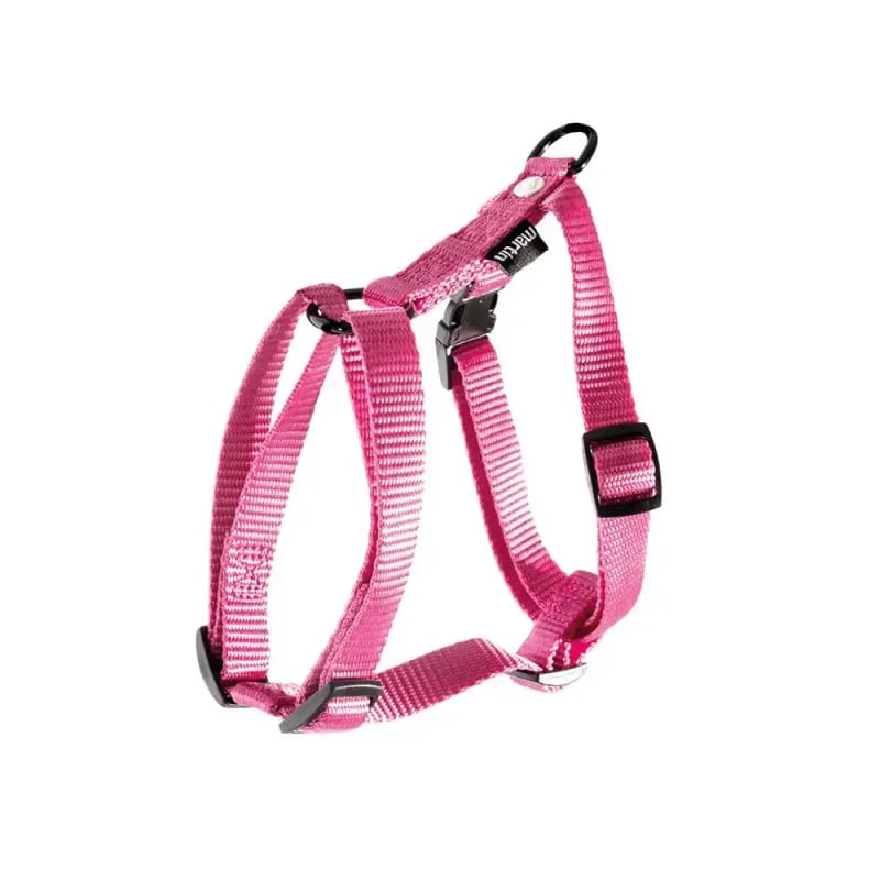 Gros plan sur harnais rose Martin Sellier pour chien : étiquette marque, boucles réglables, poignée 