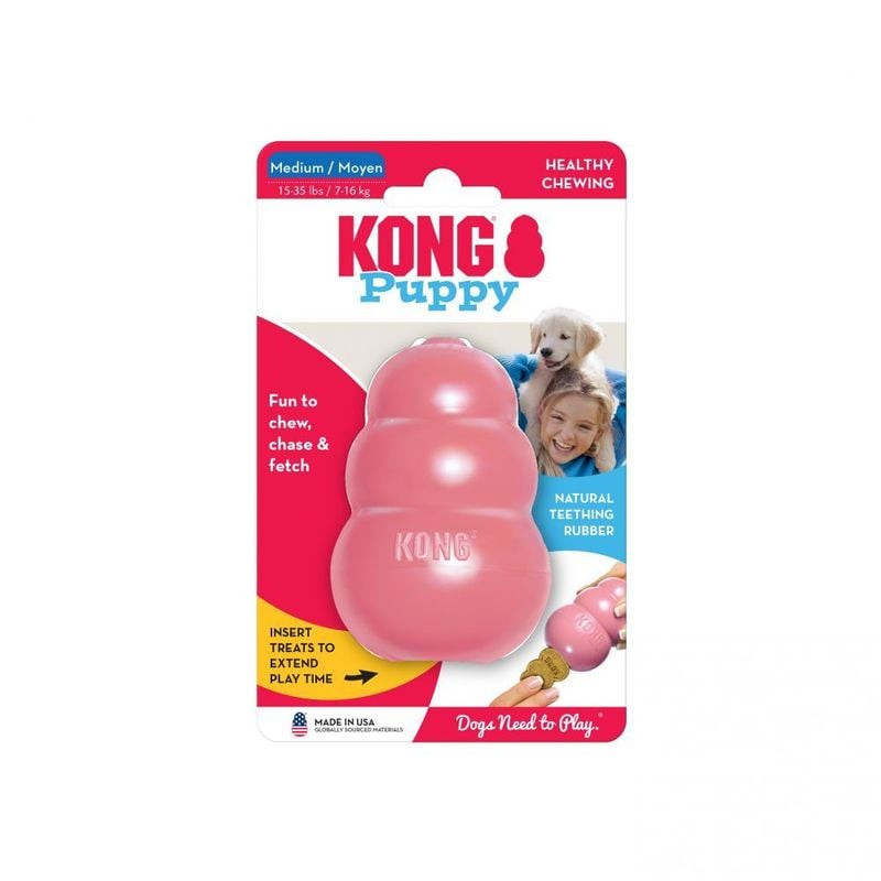 Gros plan sur le jouet KONG Puppy M bleu mettant en valeur la surface texturée en caoutchouc, le gau