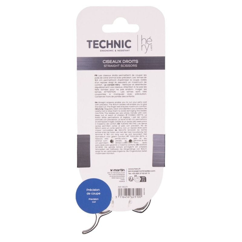 Gros plan sur les lames en acier inoxydable tranchantes des ciseaux de toilettage Hery pour une coup