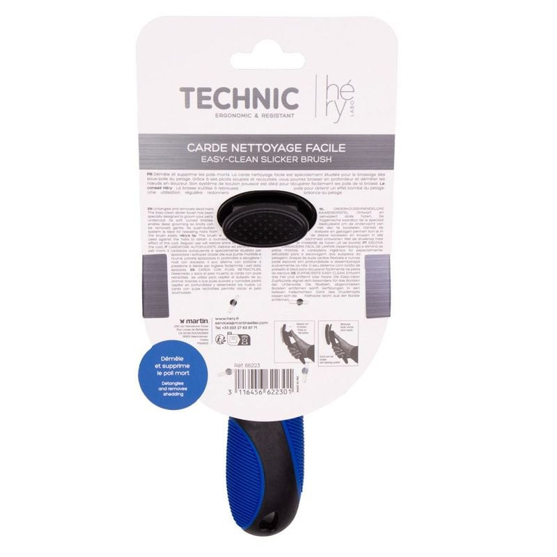 Gros plan sur la carde de toilettage ergonomique Hery avec manche et picots