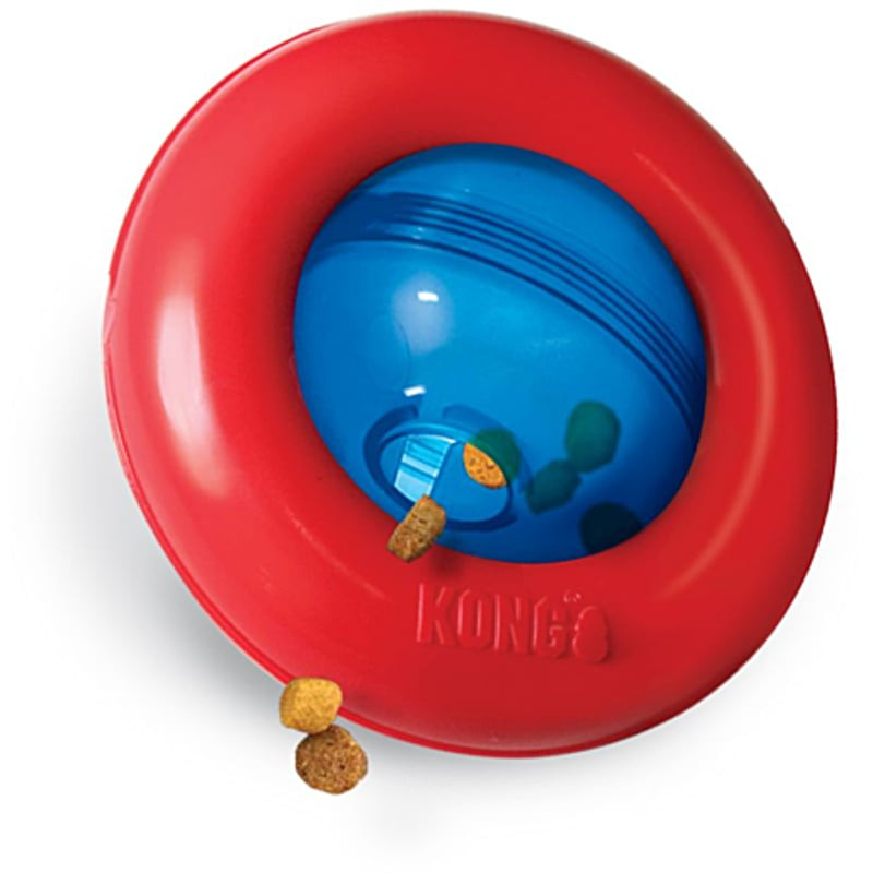 Jouet distributeur de friandises KONG Gyro L pour chien sur fond blanc.