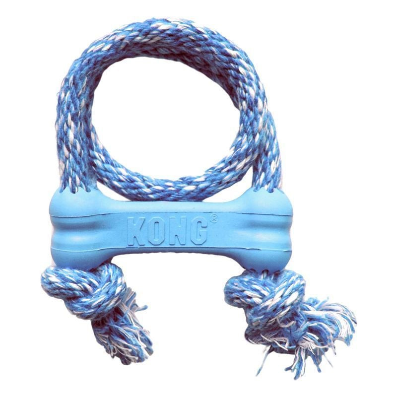 Gros plan du KONG Puppy Goodie Bone XS avec corde montrant le caoutchouc texturé et l'attache de la 
