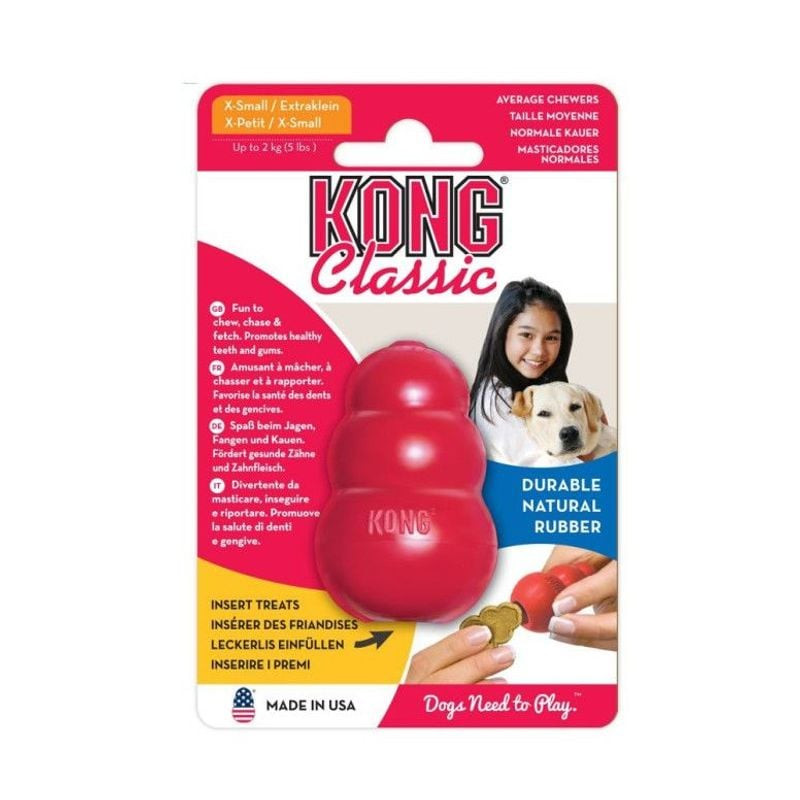 Jouet pour chien KONG Classic XS sur fond blanc, vue en angle mettant en valeur la surface texturée 