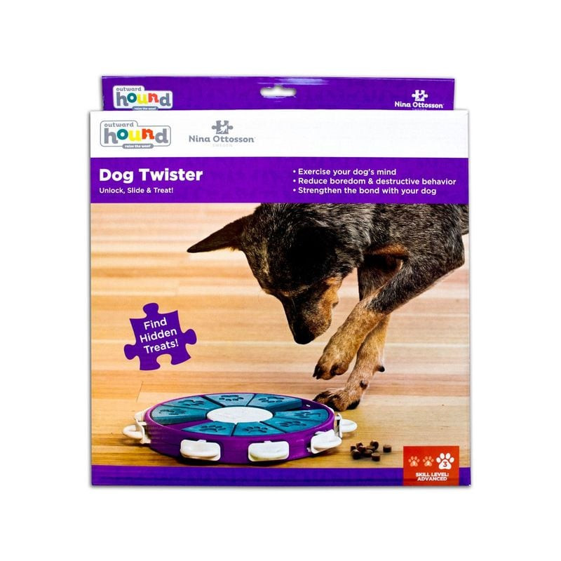 Jouet puzzle interactif Nina Ottosson Dog Twister sur fond blanc, vue de face montrant neuf comparti