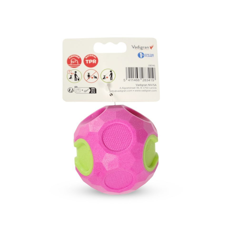 Close-up of pink Vadigran TPR dog ball showing textured surface and pleasant scent feature.