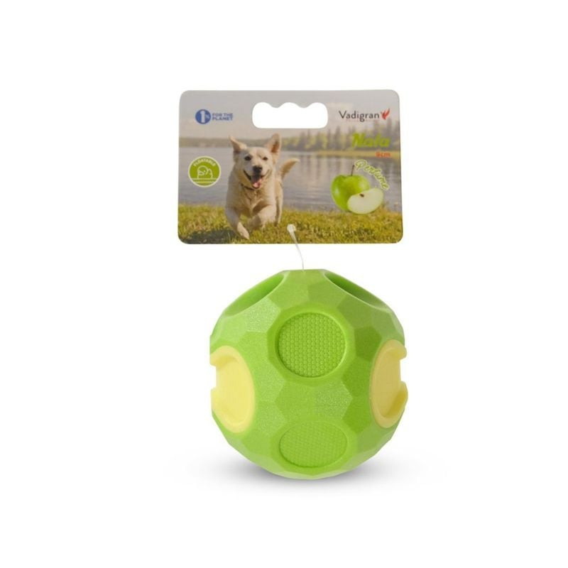 Vue latérale de la balle pour chien Vadigran TPR verte montrant la texture.