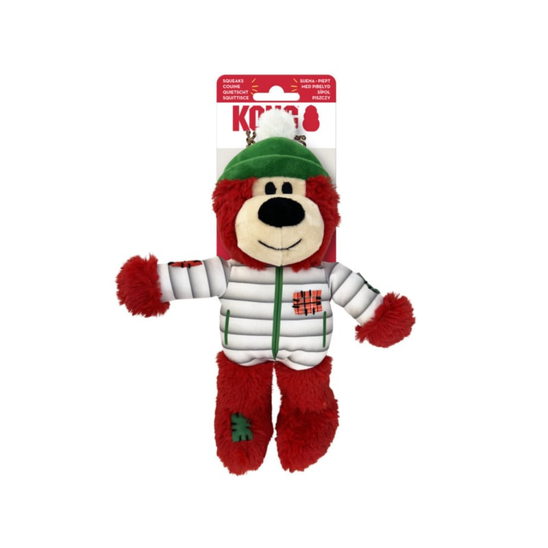Gros plan du jouet en peluche KONG Holiday Wild Knots Ours avec texture douce et motif de pull festi