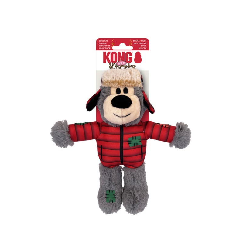 Jouet chien KONG Holiday Wild Knots Ours en peluche avec sifflet mis en évidence, montrant le squele