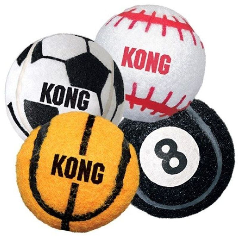 Gros plan de balles KONG pour chien : foot (noir/blanc), base-ball (rouge/blanc), basket (orange/noi