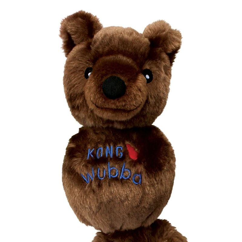 Gros plan sur les queues du KONG Wubba Friends S montrant le tissu doux et la couture.